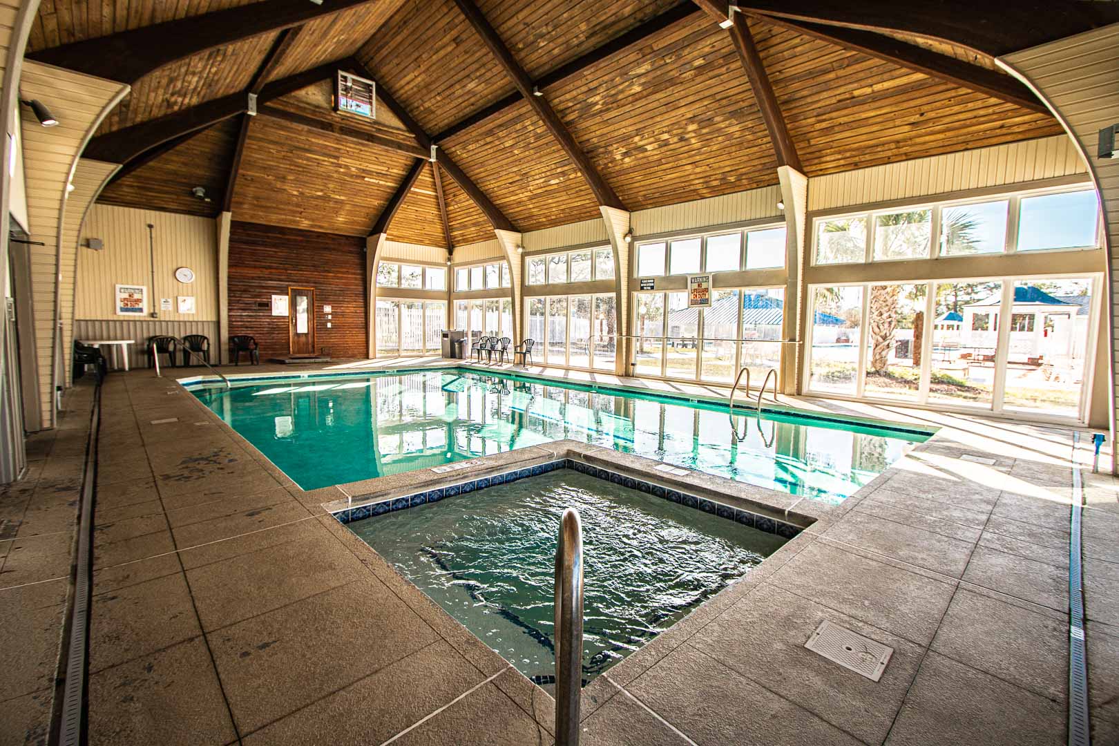 A stoic indoor swimming pool and Jacuzzi tub at VRI's Harbourside II in New Bern, North Carolina.
